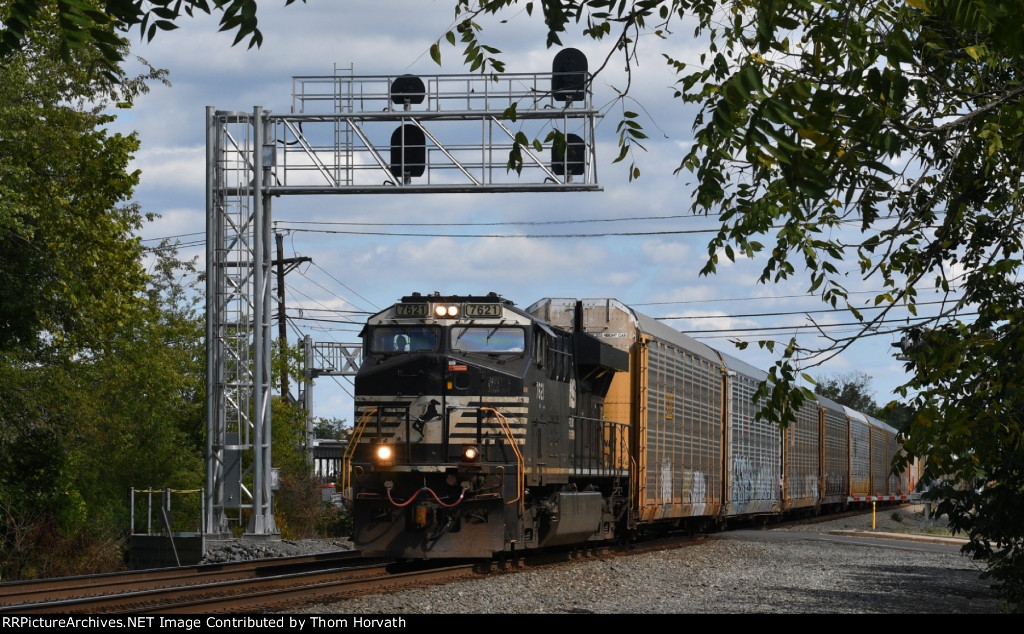 NS 11J is westbound with autoracks on Main 2 at Roycefield Rd